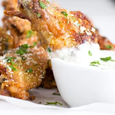 Air Fryer Garlic Parmesan Wings served with dipping sauce