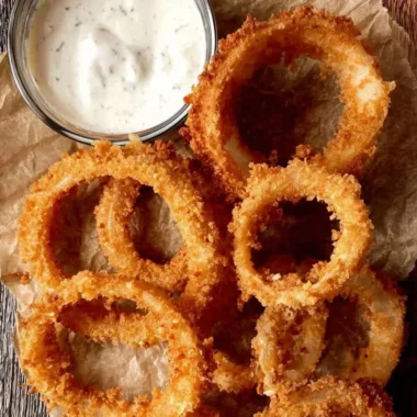 Crispy air fryer onion rings served on a plate