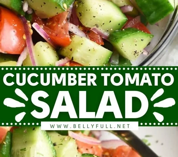 Fresh cucumber tomato salad with herbs and dressing in a bowl