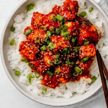 Plate of Gochujang Tofu with vibrant vegetables and spicy sauce