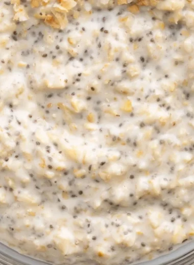 Coconut Cream Pie Overnight Oats topped with coconut and chia seeds.