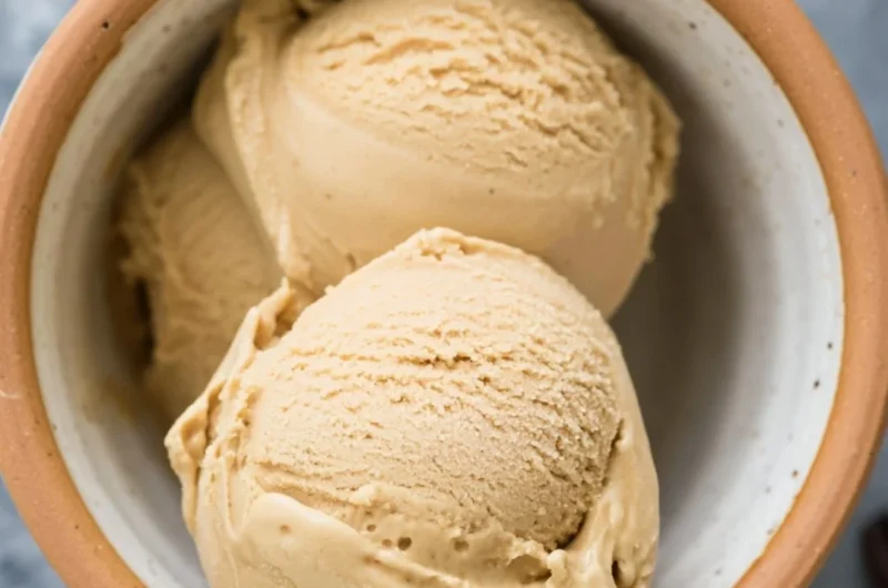 Delicious coffee ice cream in a bowl topped with chocolate sprinkles