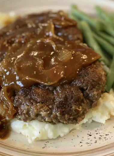 Delicious easy Salisbury steak served with gravy on a plate