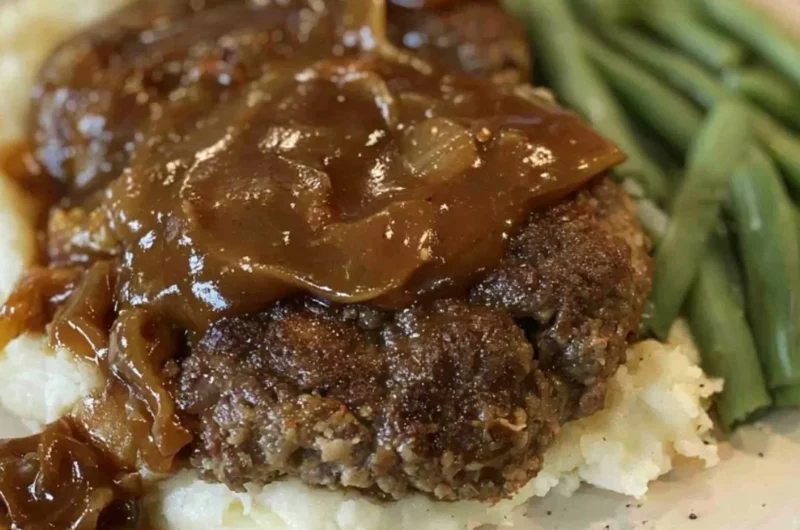 Delicious easy Salisbury steak served with gravy on a plate