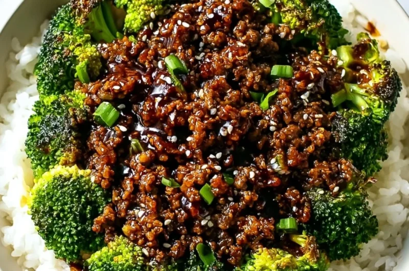 A plate of cooked hamburger meat and broccoli, showcasing a nutritious meal option.
