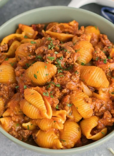 High protein taco pasta served in a bowl with toppings
