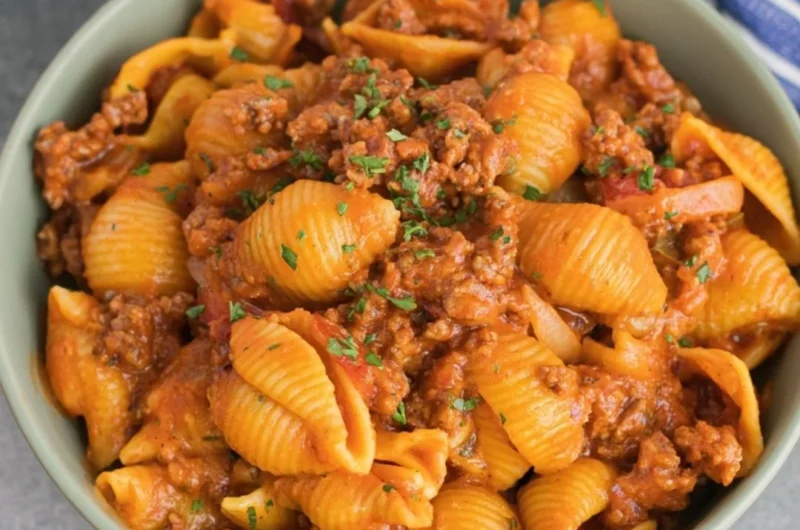 High protein taco pasta served in a bowl with toppings