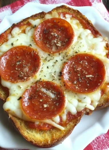 Delicious garlic toast pizzas topped with cheese and pepperoni
