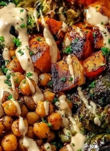 Roasted vegetable and chickpea bowl with maple Dijon tahini dressing