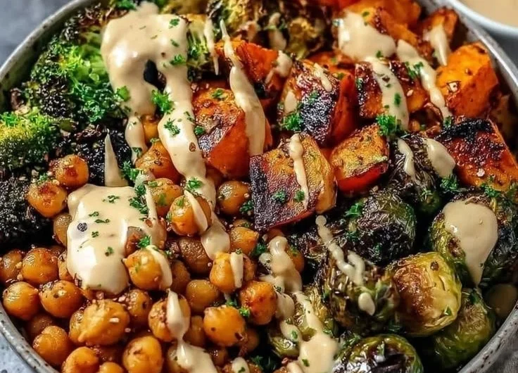 Roasted vegetable and chickpea bowl with maple Dijon tahini dressing