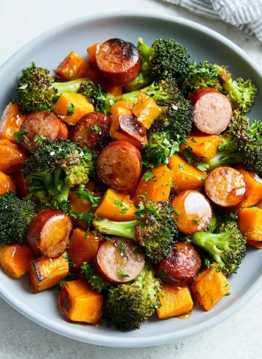Sheet pan meal featuring sausage and roasted sweet potatoes