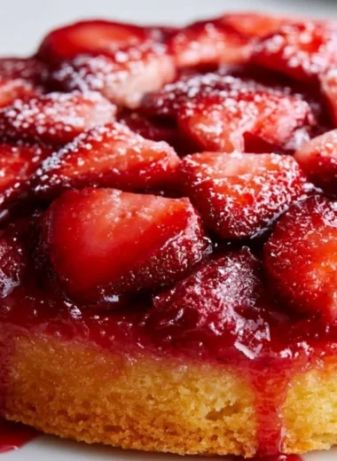 Delicious strawberry upside down cake topped with fresh strawberries