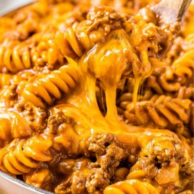 Creamy Enchilada Pasta served in a bowl, showcasing vibrant colors and texture.