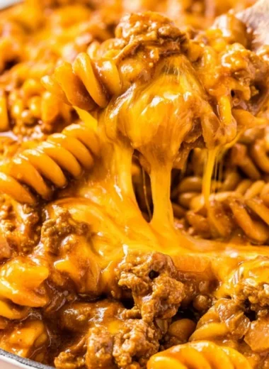 Creamy Enchilada Pasta served in a bowl, showcasing vibrant colors and texture.