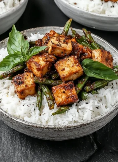 Vegan Black Pepper Tofu Stir Fry served with colorful vegetables in a bowl
