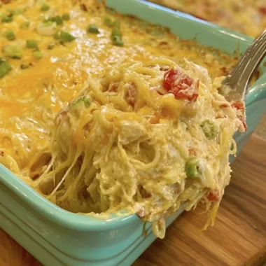 Creamy Chicken Spaghetti with Rotel and Velveeta in a serving dish