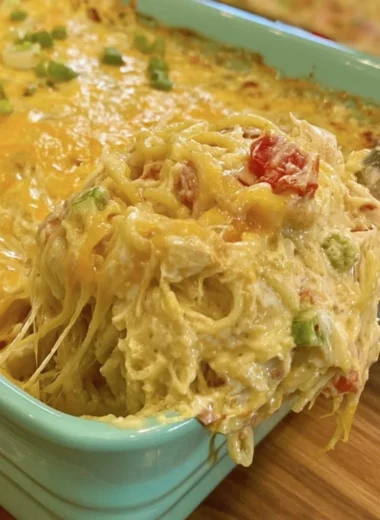 Creamy Chicken Spaghetti with Rotel and Velveeta in a serving dish