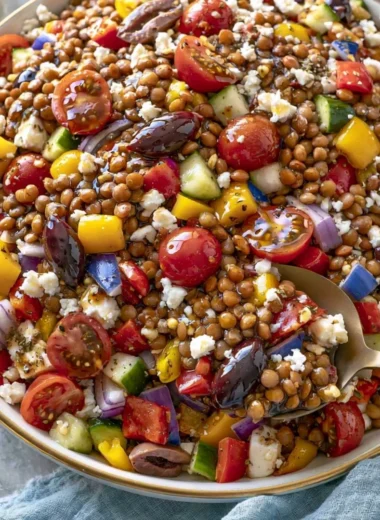 Colorful Mediterranean Lentil Salad with vegetables and herbs