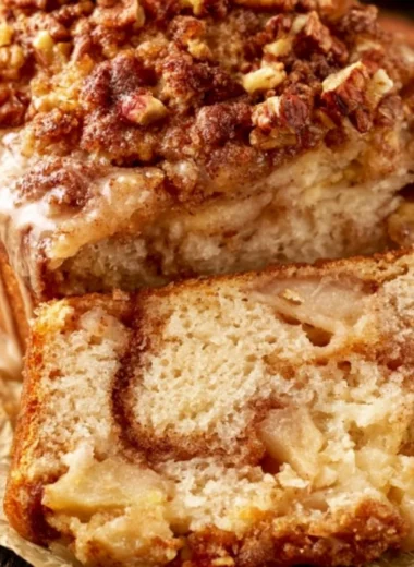 Moist and tender cinnamon apple bread loaf with cinnamon and apple slices