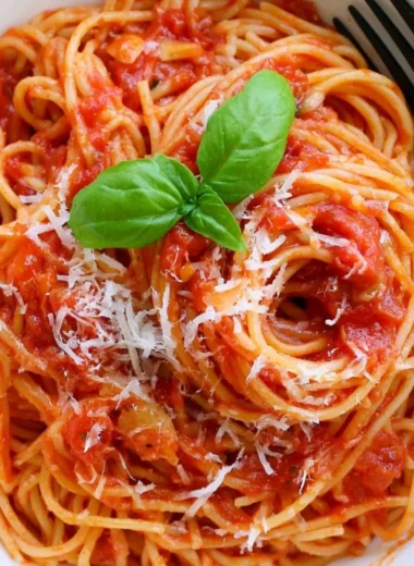 Delicious homemade Pasta Tomato with fresh ingredients and herbs