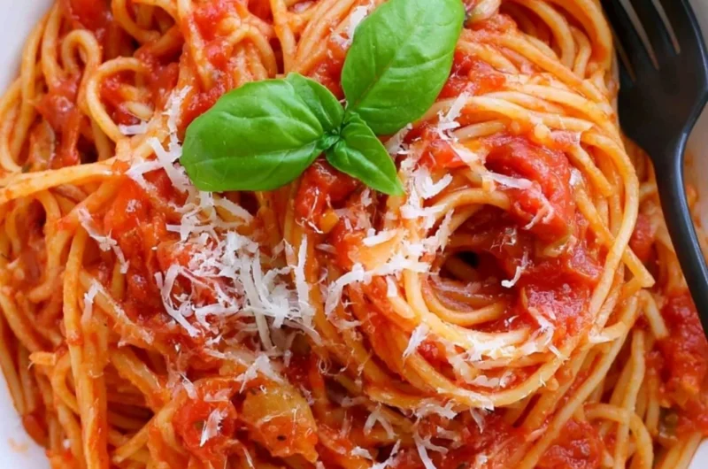 Delicious homemade Pasta Tomato with fresh ingredients and herbs