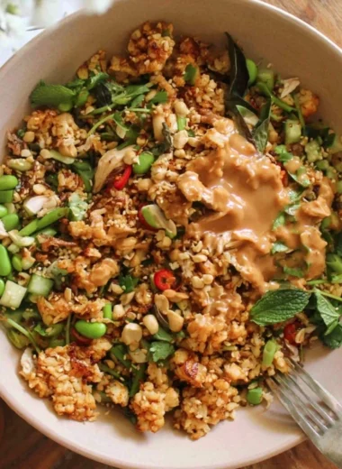 Delicious Satay Crispy Rice Salad with fresh ingredients and vibrant colors.