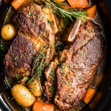 Mouth-watering slow cooker pork roast served with vegetables
