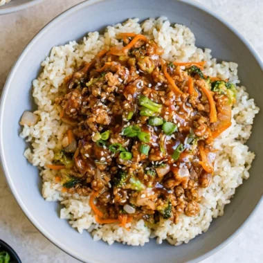 Delicious teriyaki turkey rice bowl garnished with vegetables