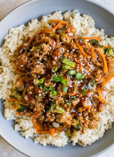 Delicious teriyaki turkey rice bowl garnished with vegetables