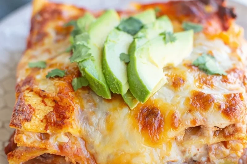 Delicious bean and cheese enchilada casserole served in a colorful dish