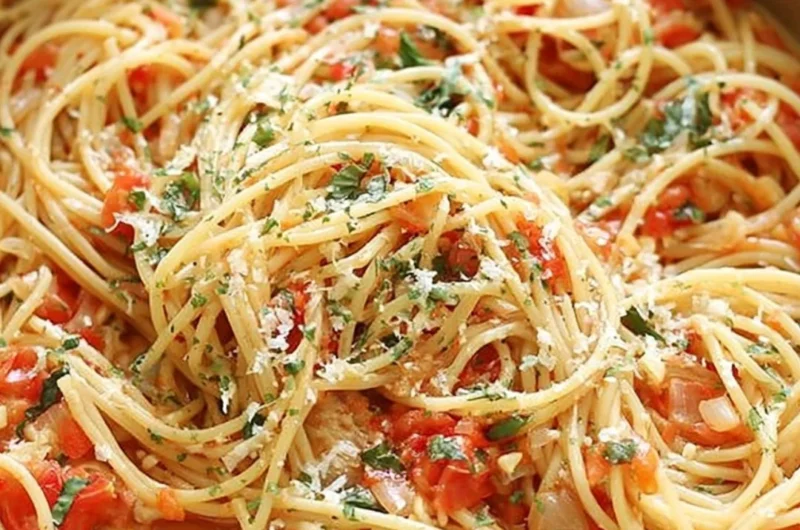 A bowl of flavorful One Pot Pasta with vegetables and herbs