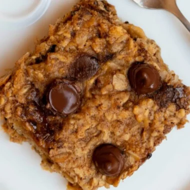 Delicious banana oatmeal bars topped with nuts and chocolate chips