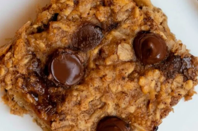 Delicious banana oatmeal bars topped with nuts and chocolate chips