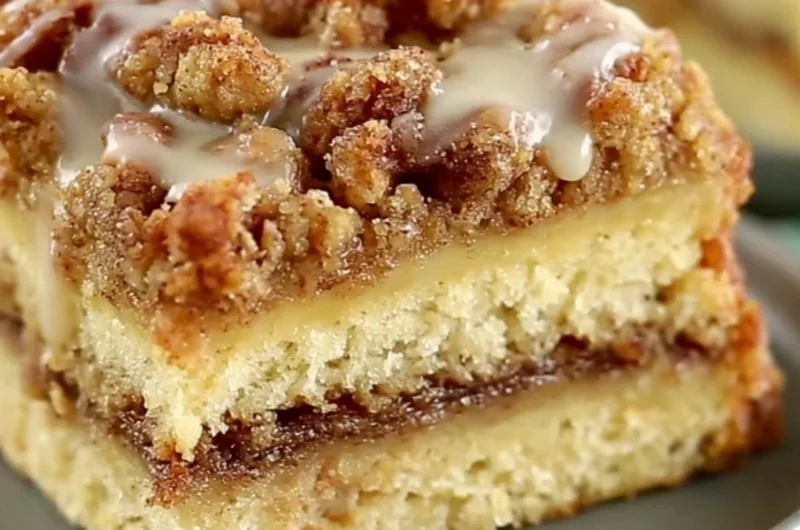 Delicious coffee cake with crumb topping and a slice cut