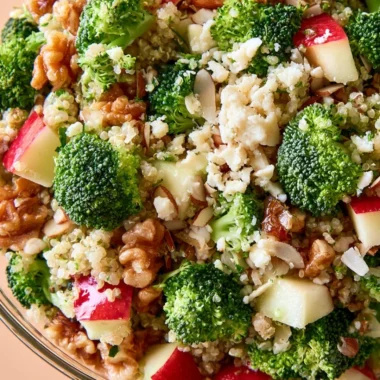 Broccoli Apple Quinoa Salad with fresh vegetables and apples in a bowl