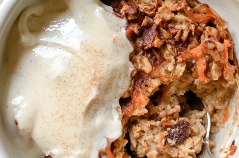 Delicious carrot cake baked oatmeal topped with cream cheese frosting