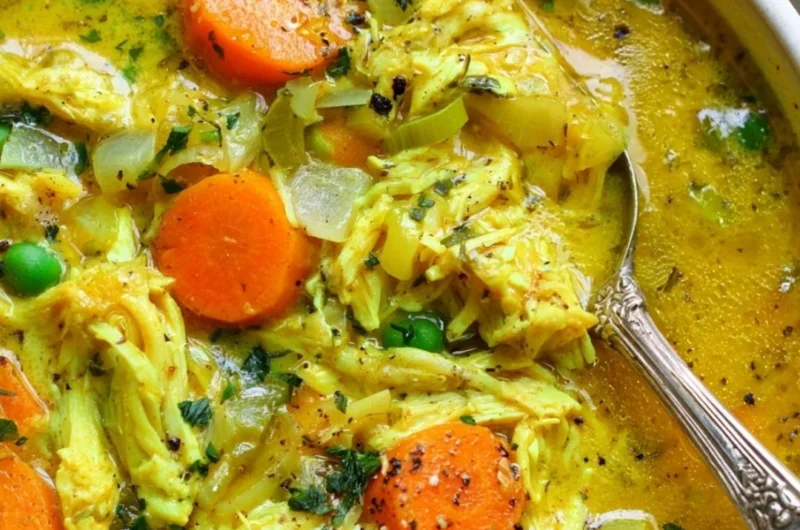 Delicious chicken soup with turmeric and ginger, rich in anti-inflammatory ingredients