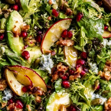 Christmas Salad with Honey Mustard Dressing served on a festive table