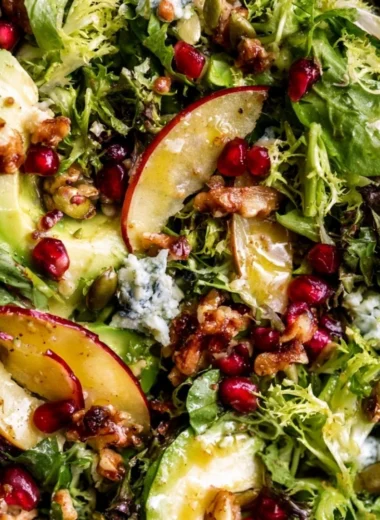 Christmas Salad with Honey Mustard Dressing served on a festive table