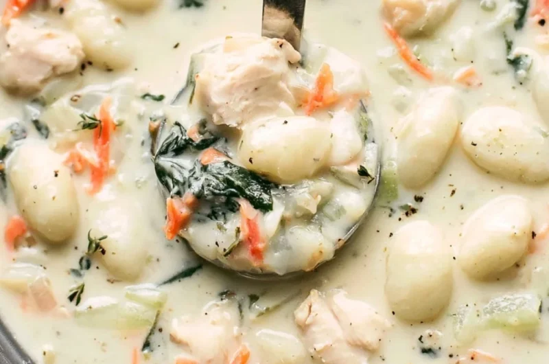 Bowl of Olive Garden Chicken Gnocchi Soup with chicken, gnocchi, and vegetables